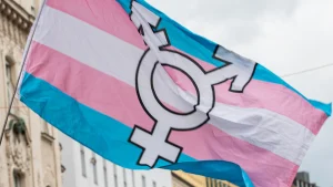 America First Legal seeks clarification after woman imprisoned for having a trans roommate.
