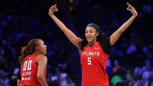Angel Reese accepts villain status in Dallas, showing off and provoking fans during Atlanta Dream's victory over Wings