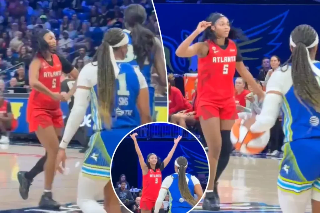 Angel Reese encourages the booing crowd in Dallas with popular celebrations