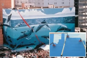 Artist Wyland expresses anger as FIFA covers his famous Whaling Wall mural in Dallas for the World Cup