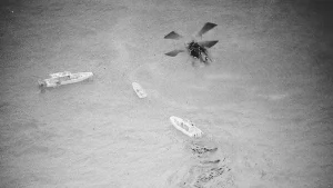 Authorities confiscate 178 kg of cocaine after a Blackhawk chases down a boat in Puerto Rico.