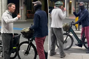 Biking Benedict Cumberbatch engages in a heated confrontation with a cyclist.