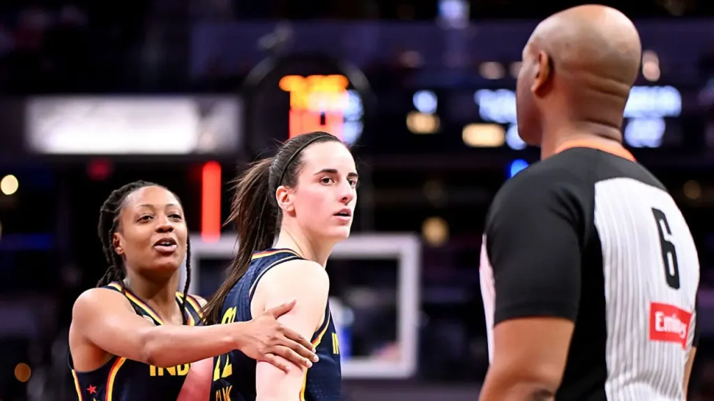 Caitlin Clark receives a technical foul following a heated exchange with an official during the Fever's victory against the Sparks.