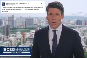 Cameraman collapses during live broadcast in what seems to be a medical emergency