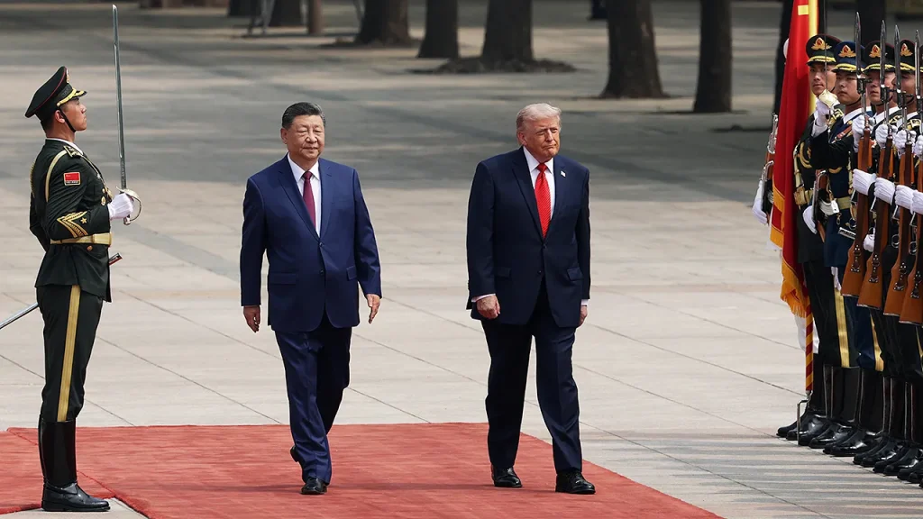 China welcomes Trump before crucial meeting with Xi.