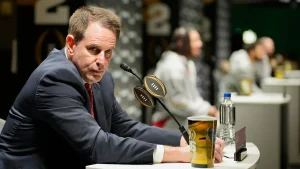 Coaches advocate for a 24-Team CFP as college football moves towards participation awards.