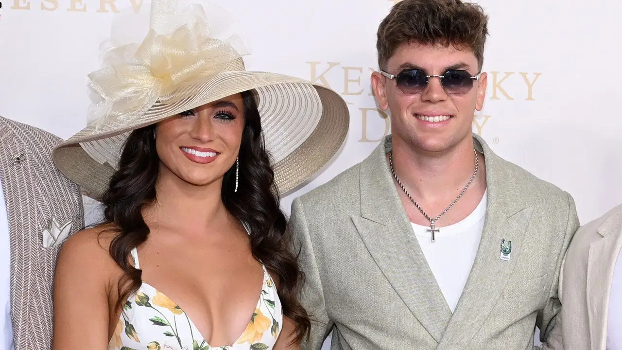 Cooper DeJean and Abby Summers from the Dallas Cowboys cheerleading team attend the Kentucky Derby red carpet.