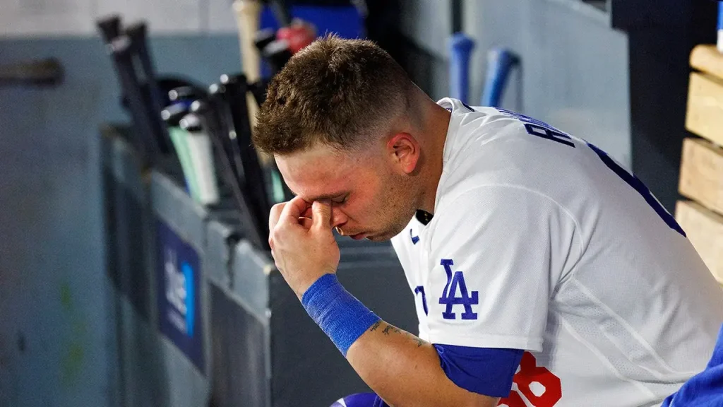 Dalton Rushing of the Dodgers hits his own head with his bat during a tough slump.