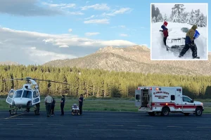 Father and son rescued by helicopter from snowy trail in California