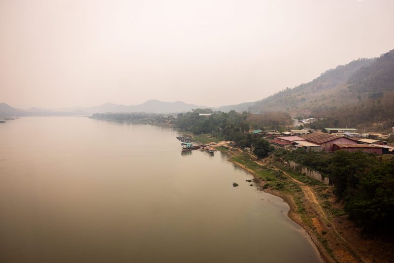 First of seven trapped miners rescued from flooded cave in Laos while search continues for two missing individuals