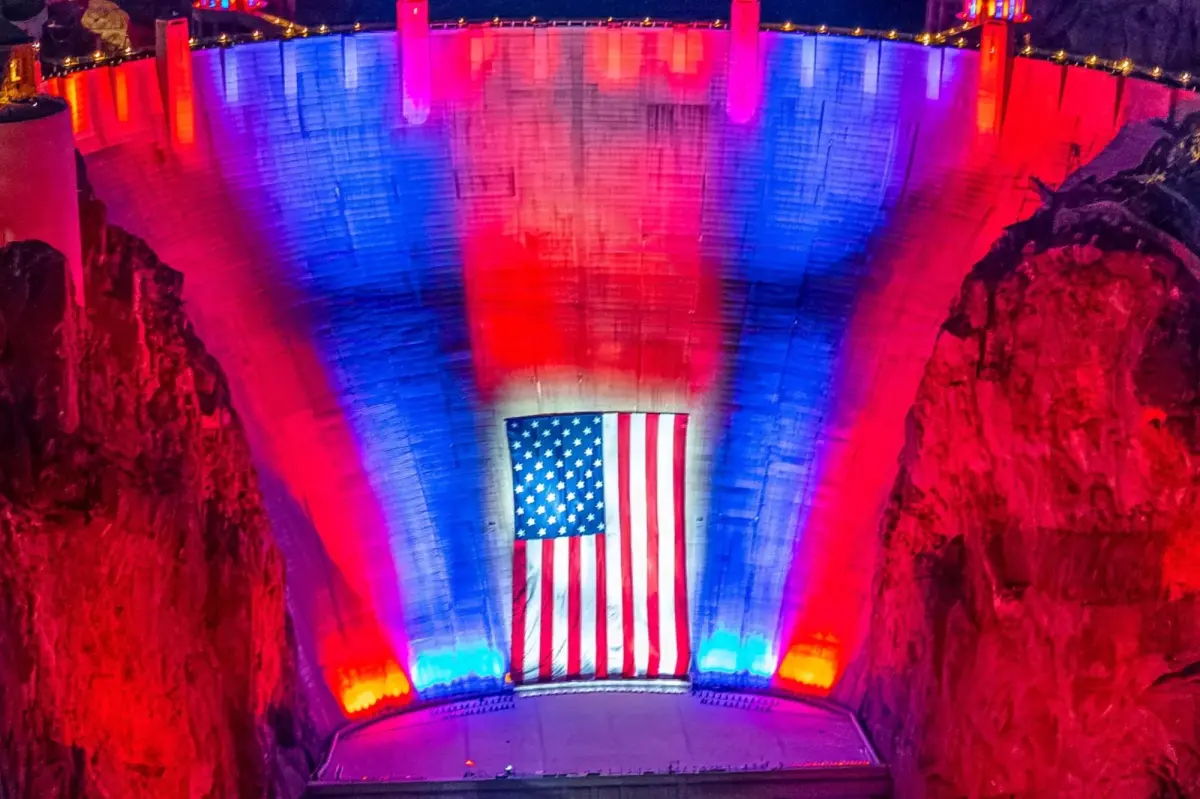 Flag at Hoover Dam back for Memorial Day after being taken down due to desert winds