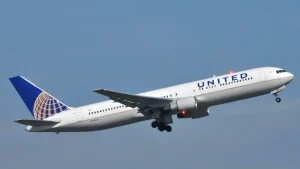 Flight returns over the Atlantic after a device on board triggers an alert