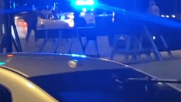 Footage captures Chicago police car being struck during teen street takeover, one individual apprehended