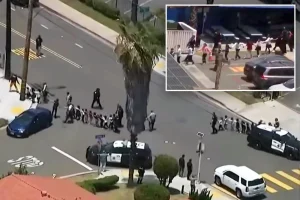 Frightening scene as young kids are taken out of San Diego Islamic Center during mass shooting