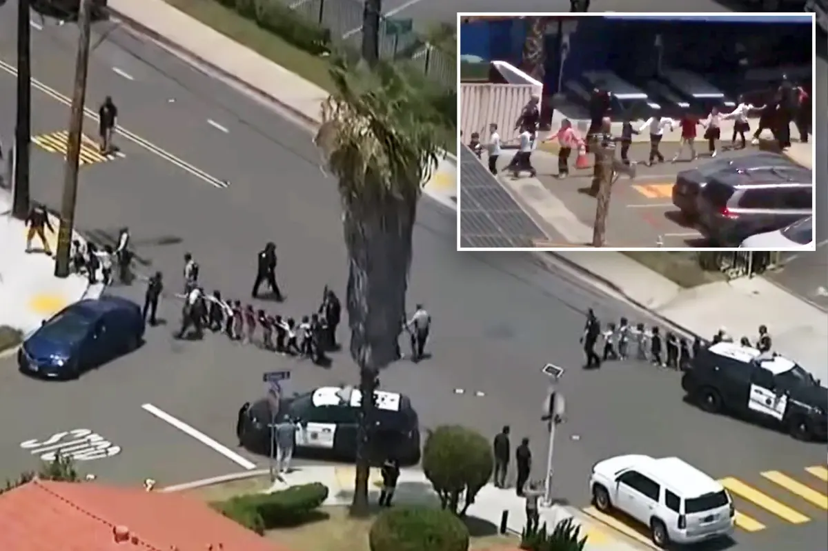 Frightening scene as young kids are taken out of San Diego Islamic Center during mass shooting