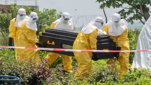 Funding cuts from the US have hindered efforts to address the severe Ebola outbreak, according to aid workers.