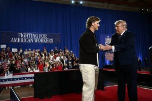 Giants quarterback Jaxson Dart presents Trump at a campaign event in New York