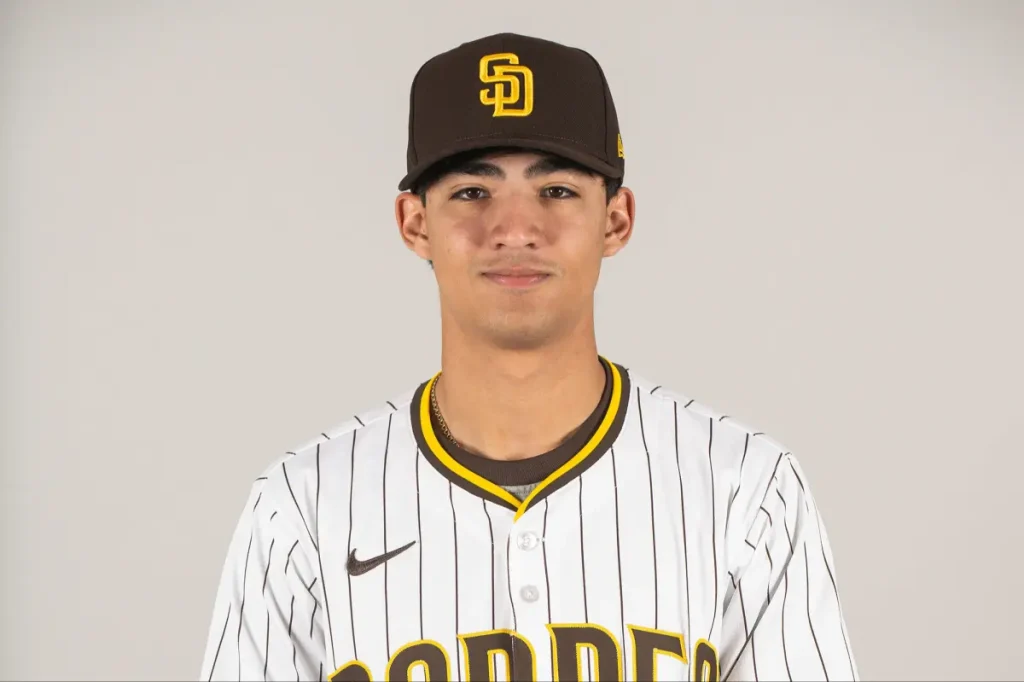 Humberto Cruz of the Padres voluntarily leaves the country after admitting guilt to a human smuggling charge.