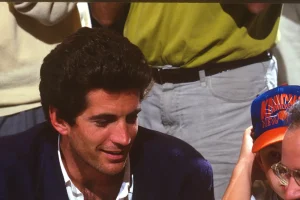 JFK Jr. cheering for the NY Knicks from a courtside seat in heaven, friend says