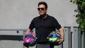 Jimmy Fallon awkwardly chews on a microphone during a strange interview before the F1 Miami event.