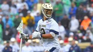 Josh Yago from Notre Dame honors Memorial Day with a tribute during the anthem ahead of the lacrosse championship game.