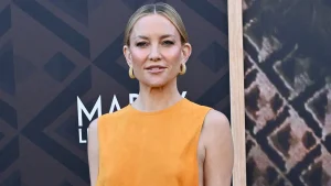 Kate Hudson faces potential wardrobe issue in striking yellow gown with cutouts