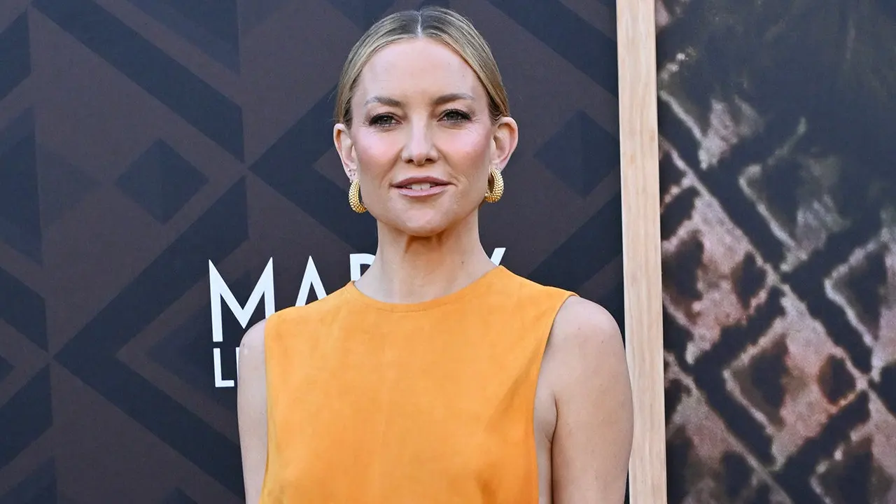 Kate Hudson faces potential wardrobe issue in striking yellow gown with cutouts