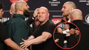 Khamzat Chimaev kicks at Sean Strickland, causing a huge brawl at the UFC 328 press conference