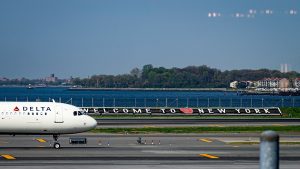 LaGuardia Airport introduces a full-size AI hologram to assist travelers in finding their way.