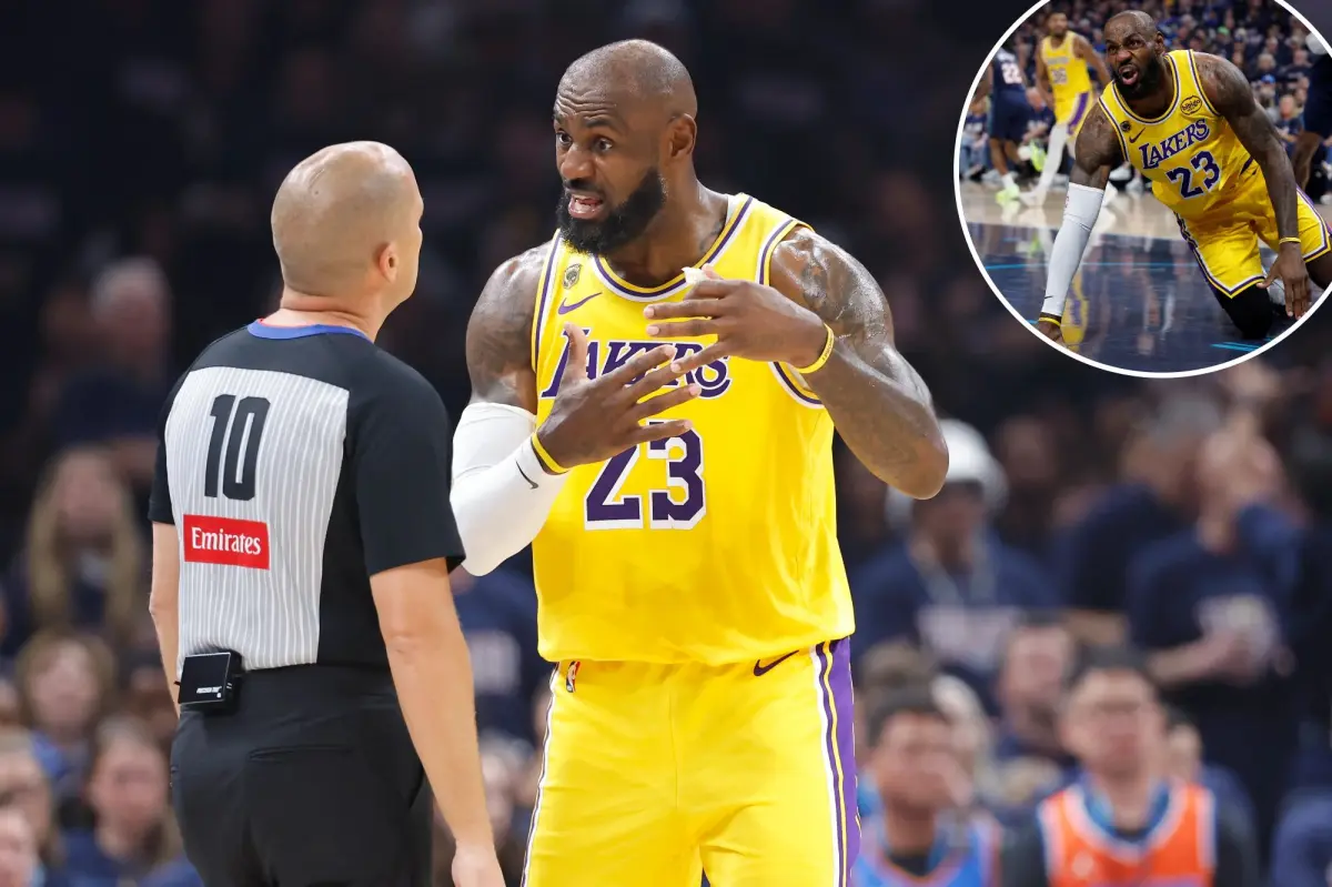 LeBron James of the Lakers confronts a fan during Game 2 defeat against the Thunder