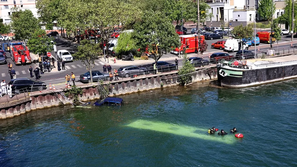Learner driver drives bus into River Seine near Paris: reports