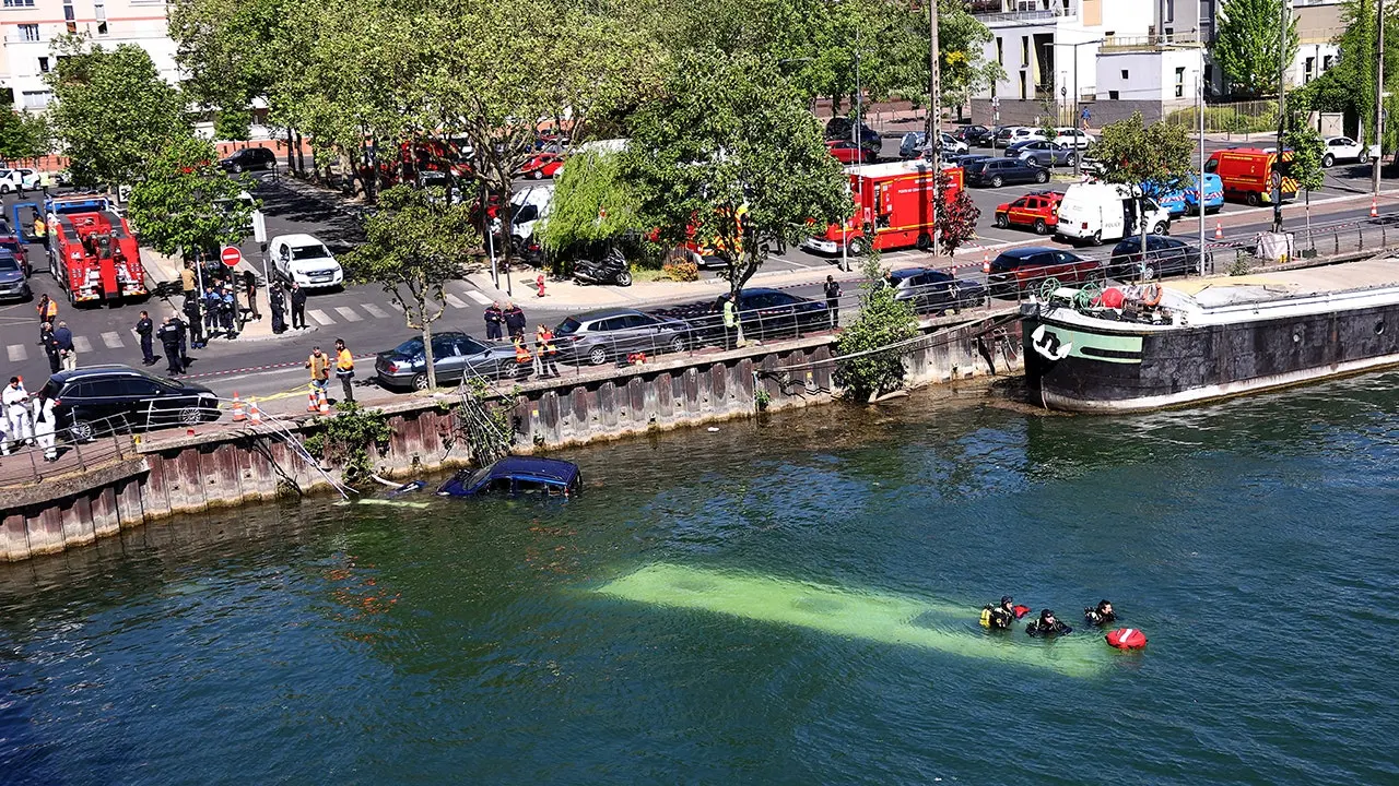 Learner driver drives bus into River Seine near Paris: reports