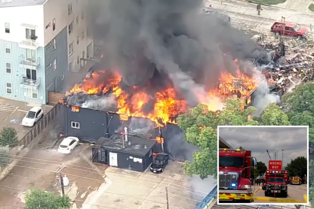 Massive blaze breaks out at Dallas apartment complex, consuming building