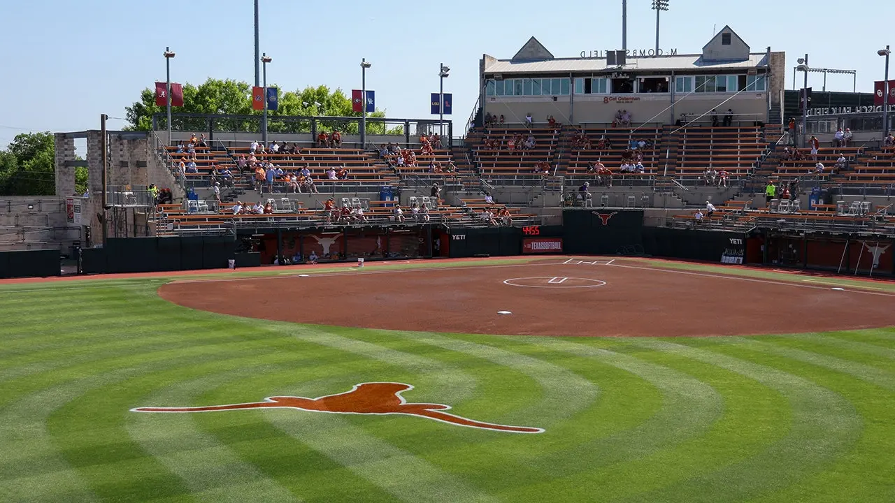 Microphone picks up inappropriate remark during college softball game broadcast