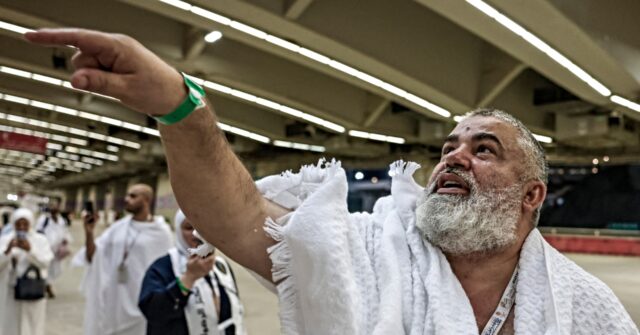 Muslim Pilgrims Throw Stones at the Devil in the Last Hajj Ceremony near Mecca