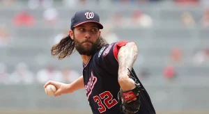 Nationals express regret to pitcher after dismissing director who confessed to religious bias