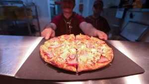 Pizza Hut surpasses Domino's as the preferred pizza chain in America, according to a poll.
