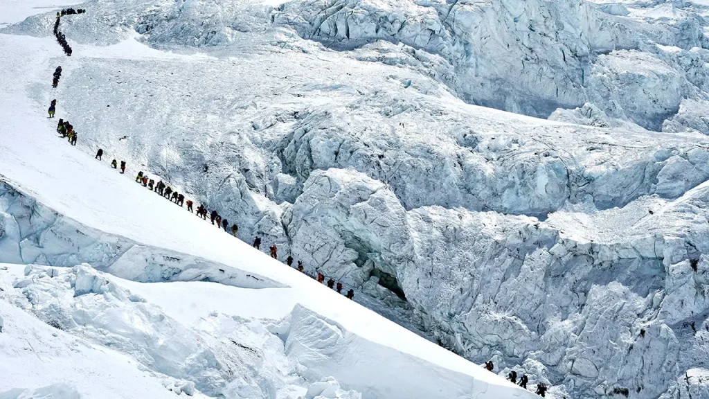 Record 274 climbers reach the summit of Mount Everest in a single day amidst concerns about overcrowding