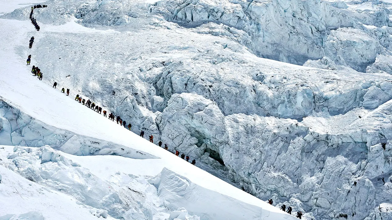 Record 274 climbers reach the summit of Mount Everest in a single day amidst concerns about overcrowding