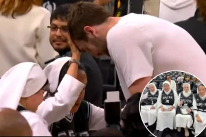 Salesian Sisters offer their blessings to Luke Kornet before Game 4 victory
