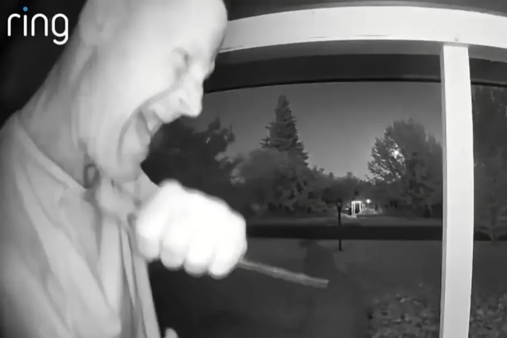 Security camera records man with a knife menacing Arden