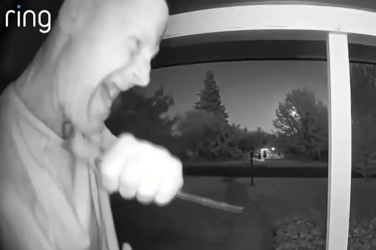 Security camera records man with a knife menacing Arden