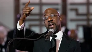 Sen Raphael Warnock believes Democrats need to avoid jargon to connect with young men.