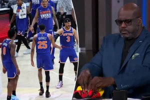 Shaq seeks to inspire the Hawks after their first half against the Knicks.