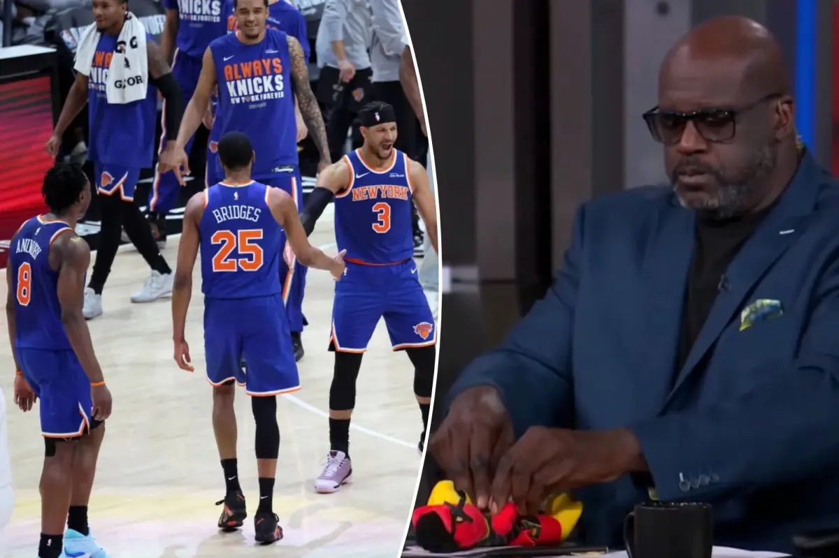 Shaq seeks to inspire the Hawks after their first half against the Knicks.