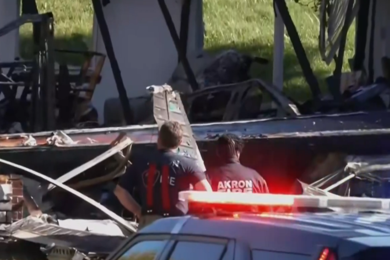 Small plane crashes into home in Akron, resulting in two fatalities and a significant fire