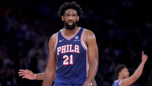 Tiki Barber advises Joel Embiid to stop complaining after he expressed concerns about the Knicks being too physical.