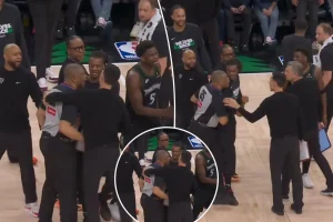 Timberwolves coach Chris Finch addresses 'unprofessional behavior' as NBA referee is held back during a heated exchange.