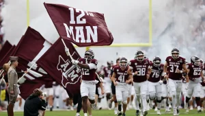 Top Texas A&M offensive line recruit faces backlash online for unusual hat ceremony