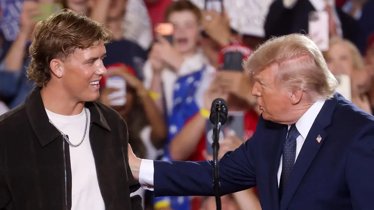 Trump praises Giants' Jaxson Dart despite backlash over event introduction.